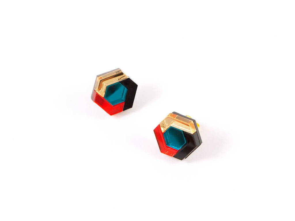 Acrylic, hexagonal stud earrings in teal blue, orange and gold