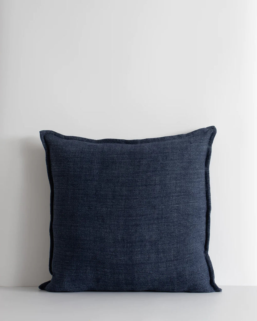 The Baya Flaxmill textural linen cushion with flange edge in blue colour 'Ink'