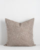 A coffee-brown cushion by Baya NZ, seen in full against a white background