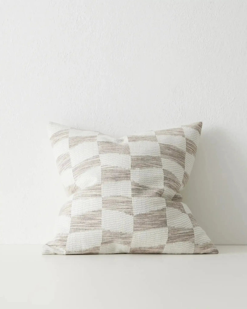 White and beige geometric cushion in a check pattern, by Weave Home nz