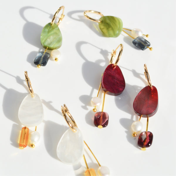 NZ designer Hagen and Co dangle earrings feathring acrylic, glass beads, and a freshwater pearl charm