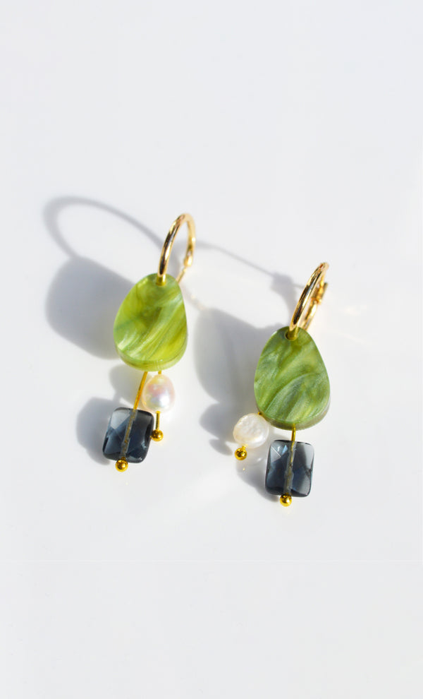 Stunning Hagen + Co earrings featuring green acrylic, blue glass and a freshwater pearl charm