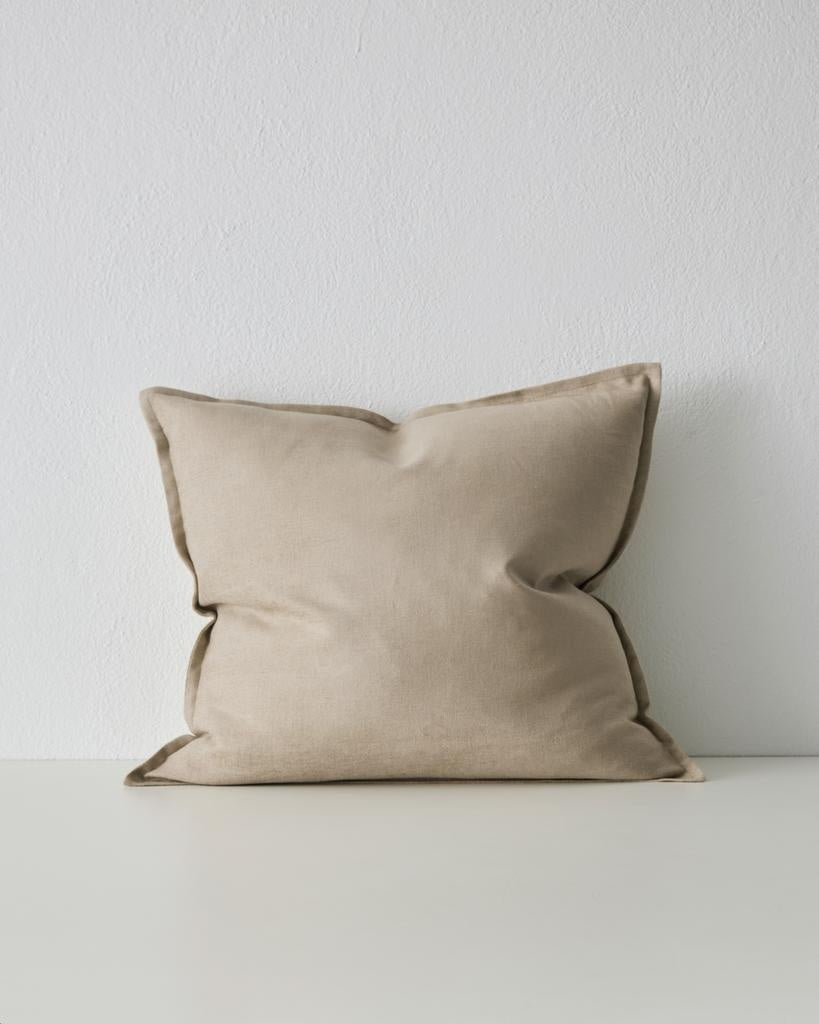 The Weave Home neutral Fiore cushion in colour 'Ecru' with flange edge