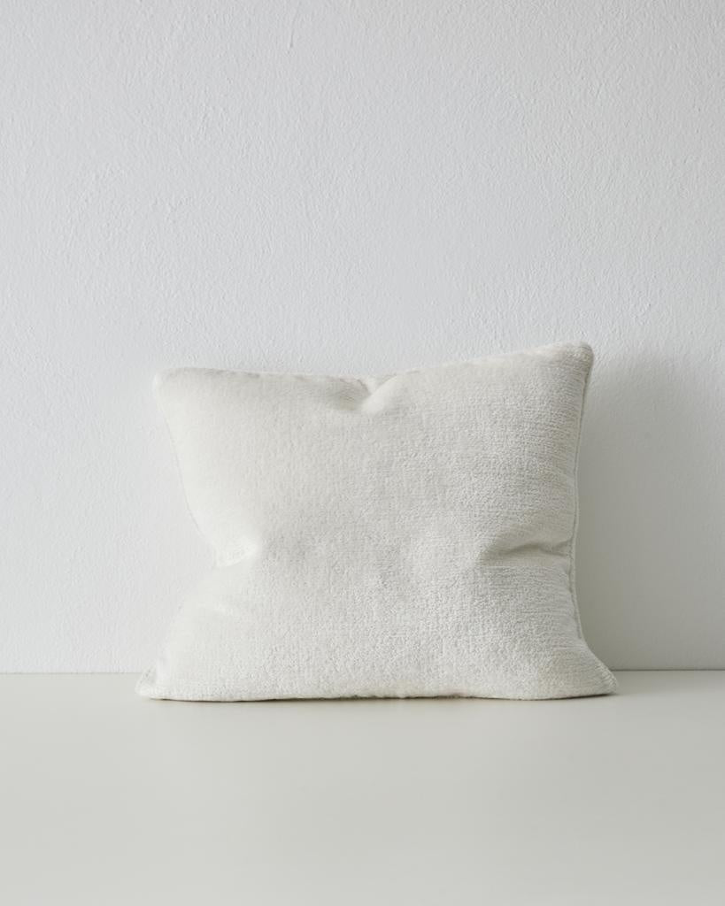 A luxurious clean white chenille cushion with piping - the Tempo Pearl by Weave