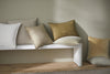 Neutral Fiore high quality cushions by Weave Home NZ, scattered across a benchseat.