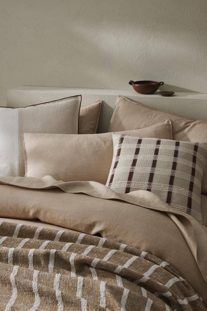 Home decor - cushions, bedding, and throw -for a stylish bedroom, by Weave Home.