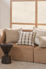 Stylish cushions pairings - by Weave Home nz -on a couch in a contemporary home.