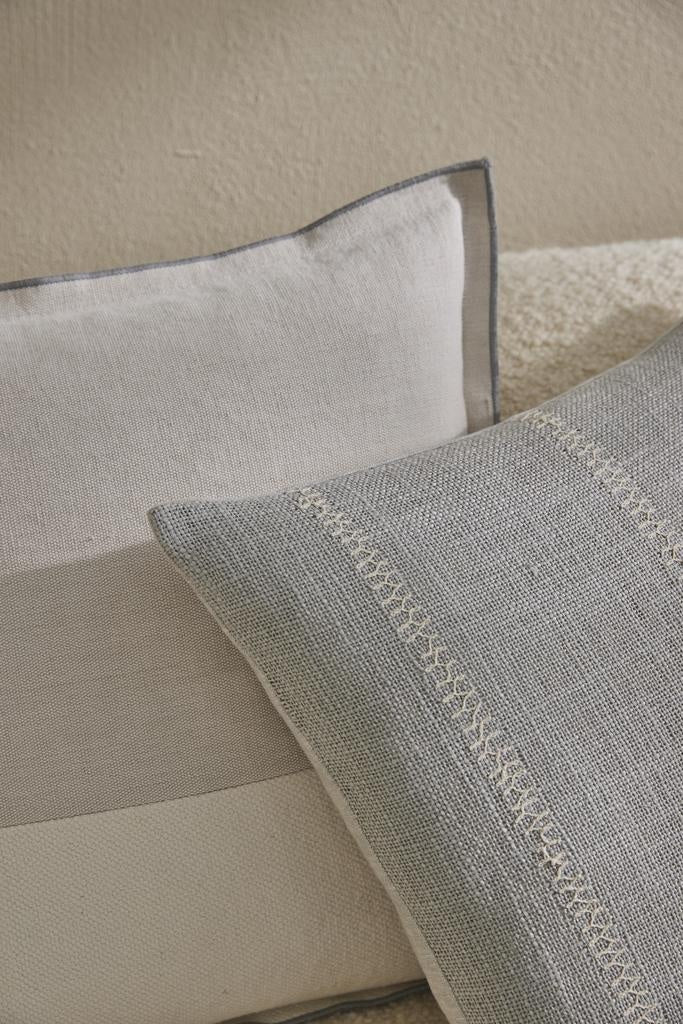 Designer cushions in neutral tones by Weave Home