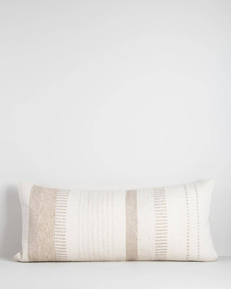 An extra-long lumbar cushion in white and beige - the Bettie by Baya.