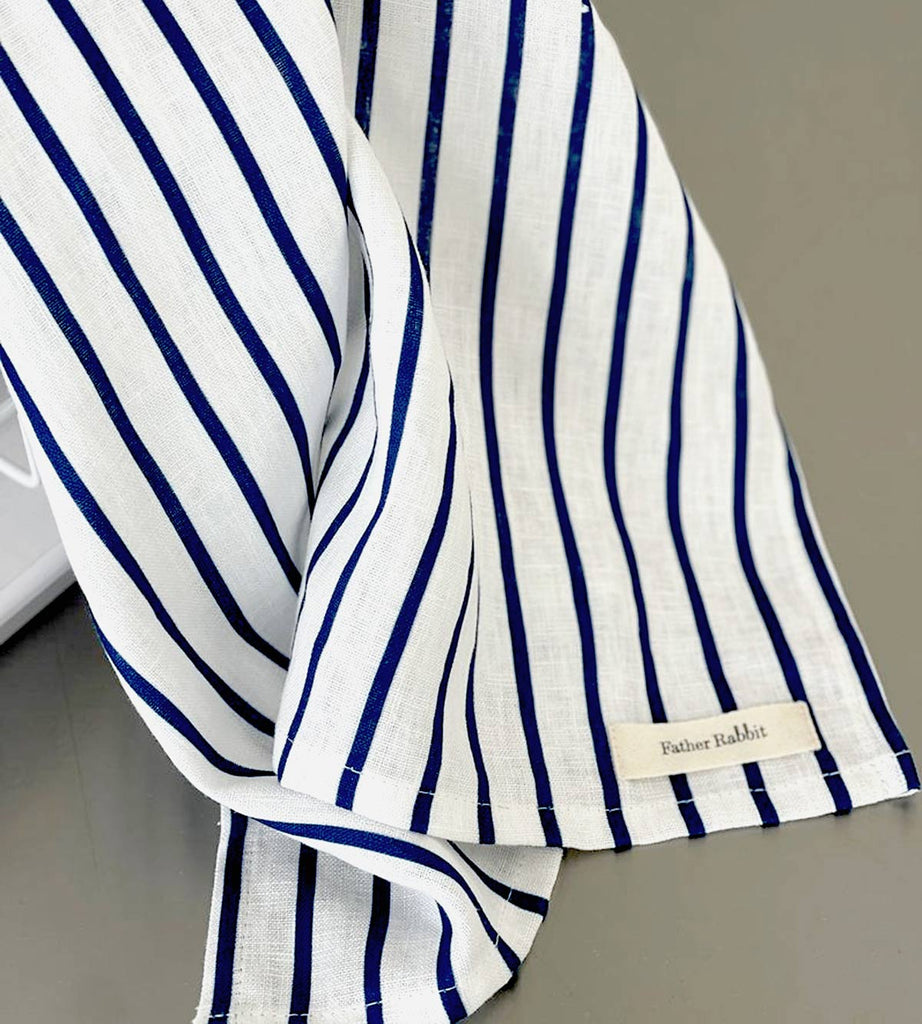 A striped tea towel from Father Rabbit, in the shade French Nautical Navy Stripe. The blue and white stripes add an element of bright fun to the kitchen.