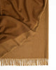 A two-toned caramel brown wool throw blanket by Weave NZ