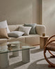 Designer cushions by Weave Home NZ on a couch in a modern living room whcih also features the Weave Puglia cushion.