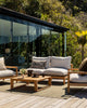 The Lonsdale, green outdoor rug by Baya, seen in a modern home outdoor seating area