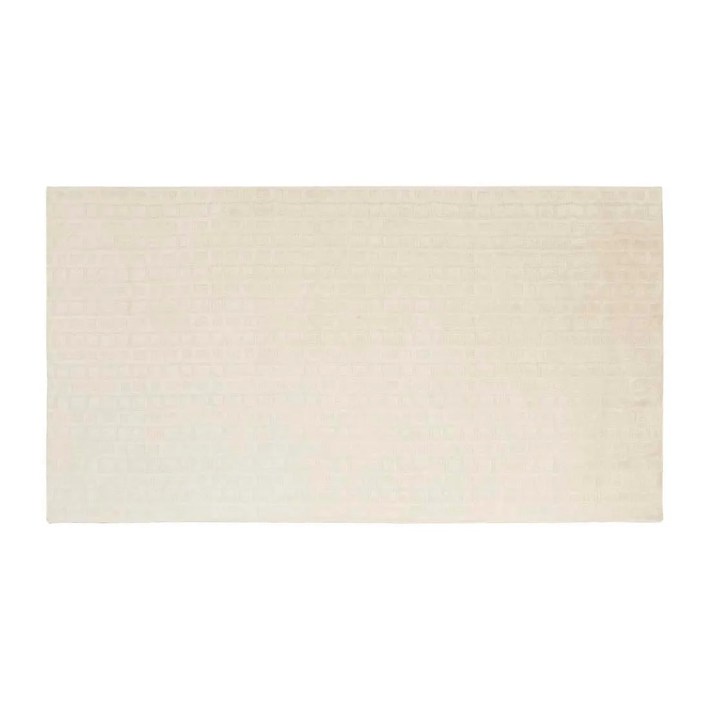 Full view of Corner of a creamy white wool-blend floor rug featuring an abstract horizontal pattern, by Globe West and Soren Liv nz