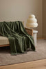 The Glenorchy woollen throw blanket in two shades of green, by Weave NZ