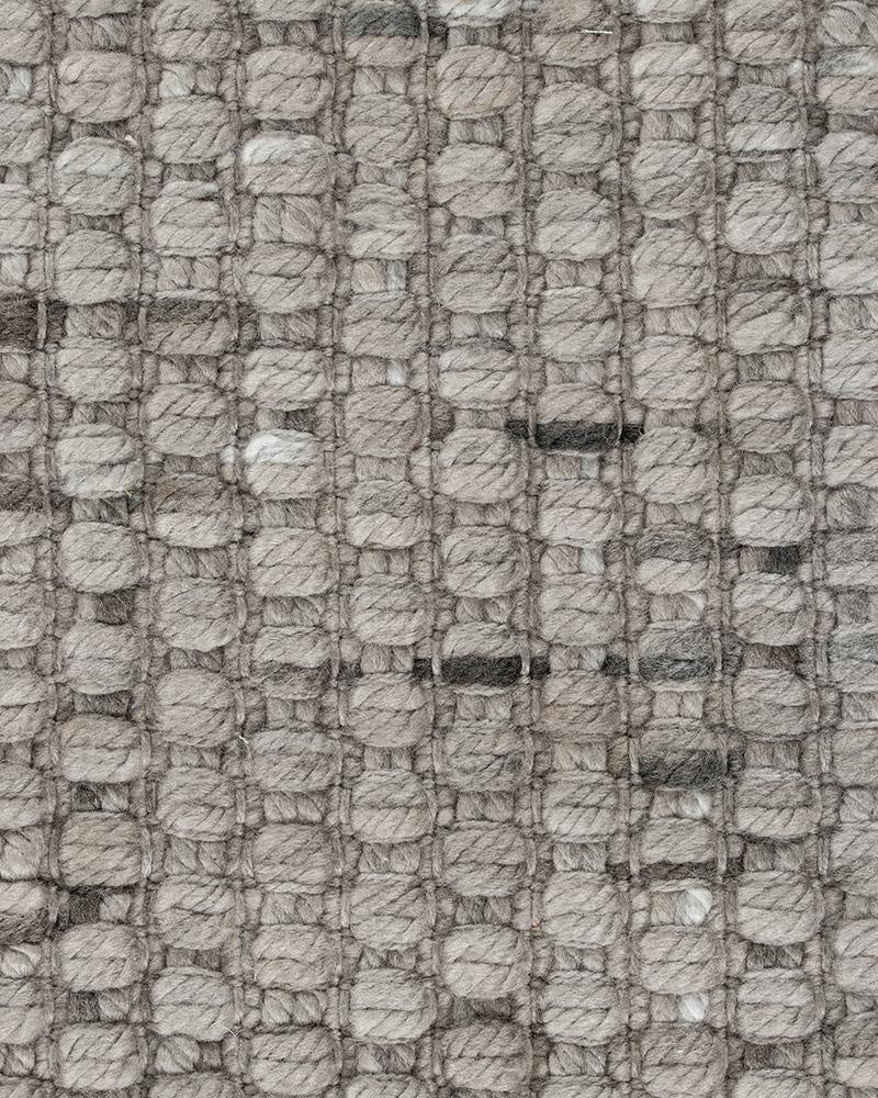 Extreme close up of the textural weave of the Baya Pelorus Grey outdoor rug 