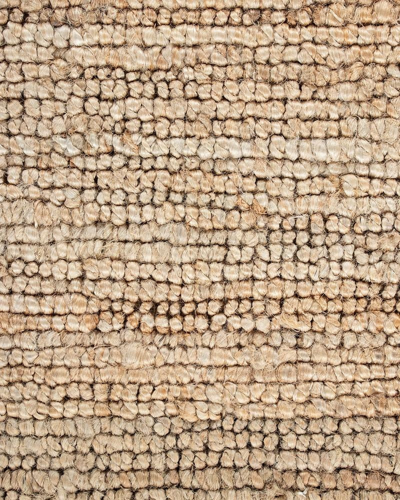 Close up of Baya's Papeete jute runner rug showing the modern bobbly weave