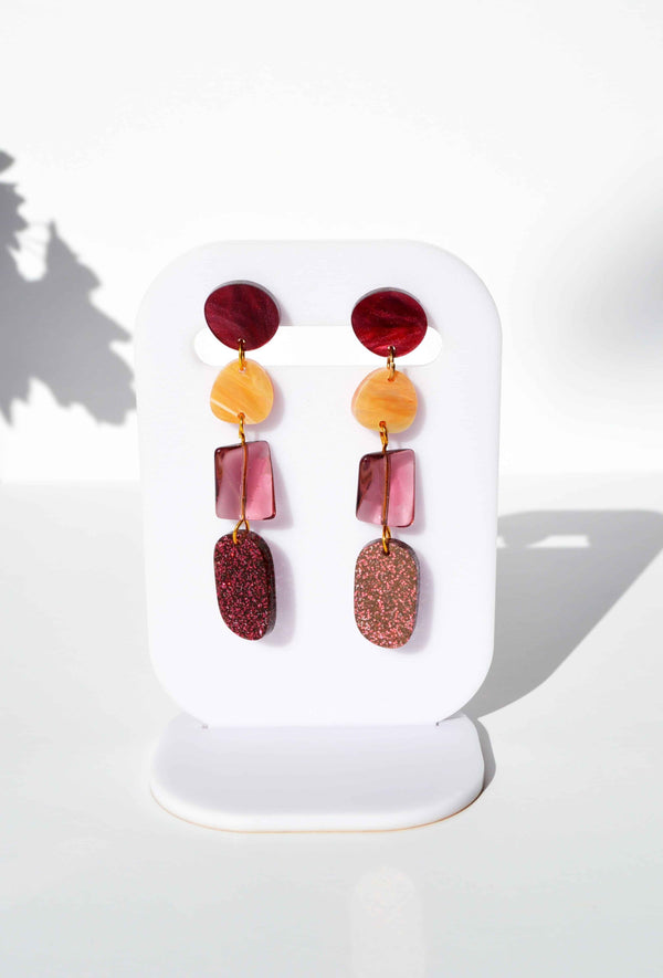Stunning Hagen + Co dangle earrings in merlot and orange tones