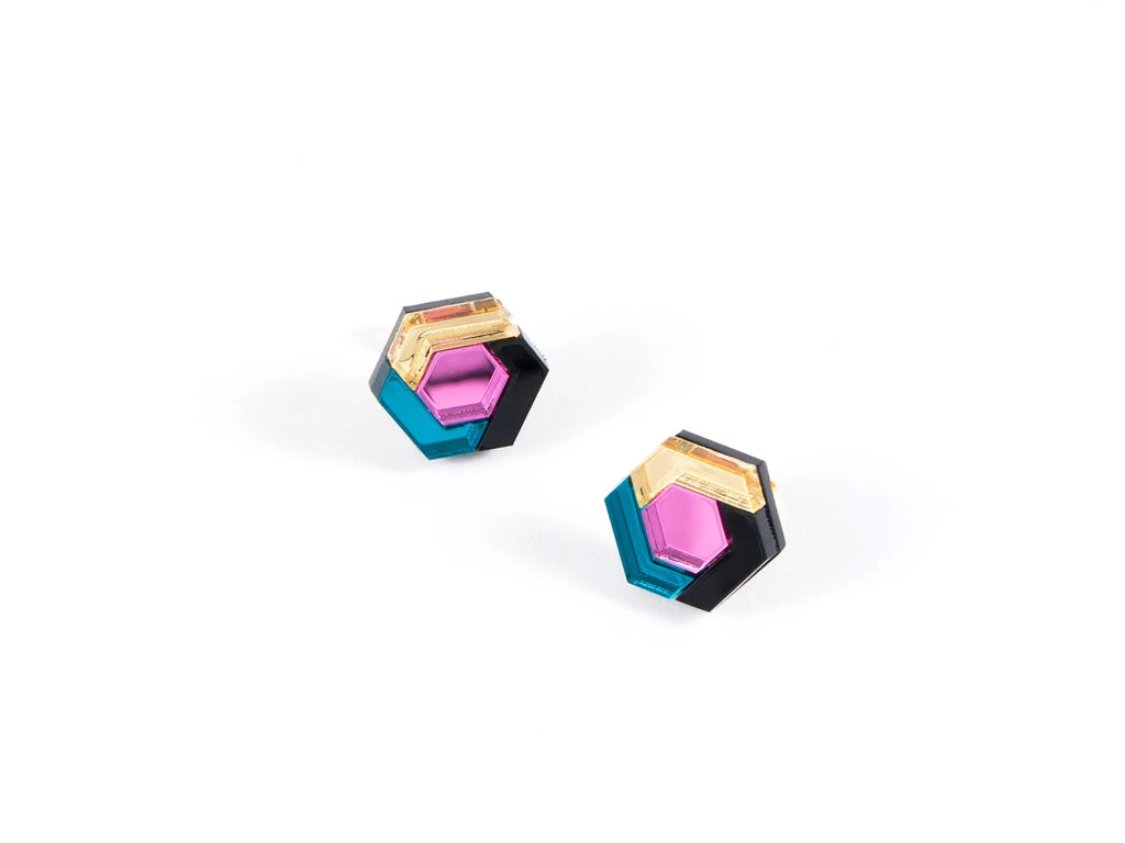 Hexagonal acrylic earrings in pink, teal and gold, by Mystic Forms