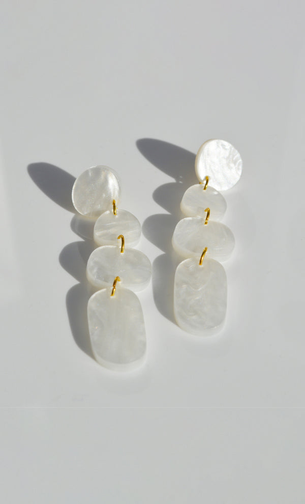 Hagen + Co dangle earrings in a white pearl acrylic