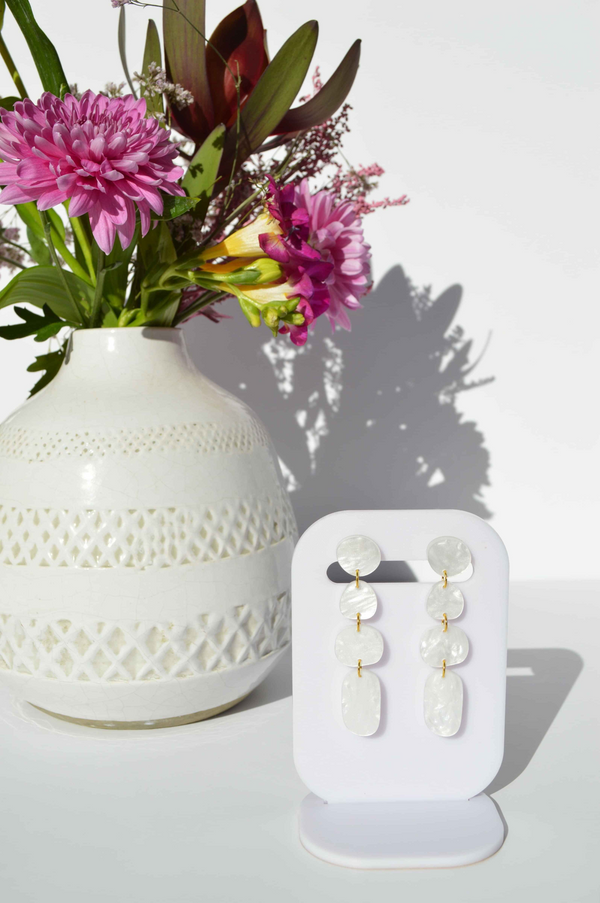 Elegant white, pearl-coloured dangle earrings by NZ designer Hagen + Co
