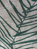 Close up of the handprinted linen tea towel 'Leaf Sage Green' by Smitten Design nz