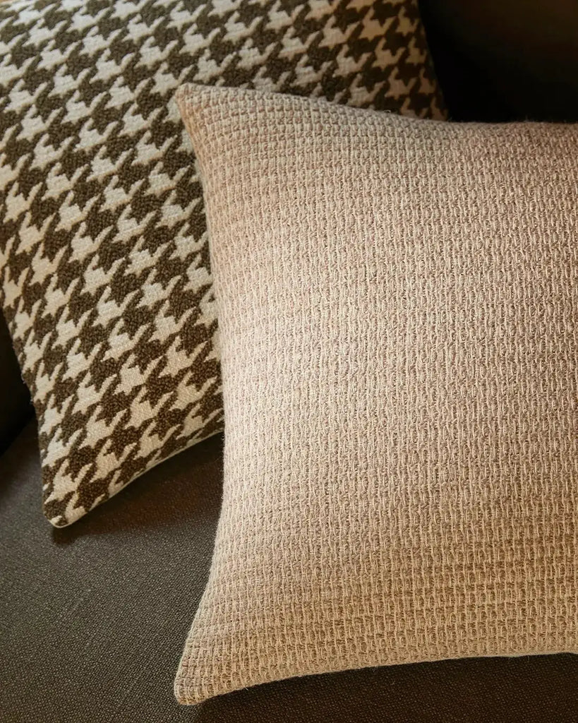 Close up of the Nicolo Natural cushion next to the houndstooth Givoanni cushion