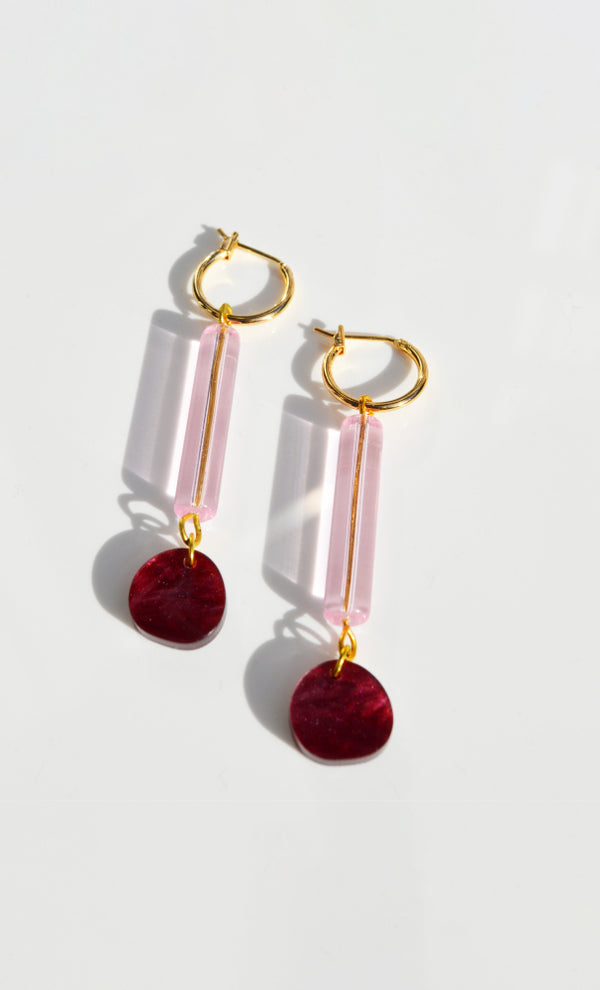 An elegant pink, burgundy and gold pair of dangle earrings by NZ designer Hagen + Co