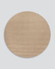 The round light-brown 'Biscuit' wool Dorset floor rug by Baya, seen from above