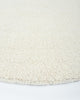 The beautiful Dorset Natural White boucle-style floor rug by Baya, seen close up in perspective