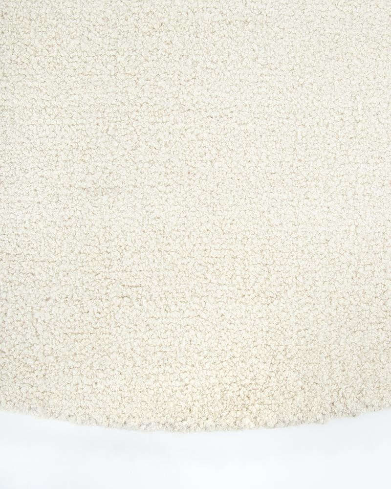 The beautiful Dorset Natural White boucle-style floor rug by Baya, seen close up 