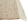 The Tepih Lunan wool and jute blend floor rug in a cream and umber colour, highlighting the cream fringe detail