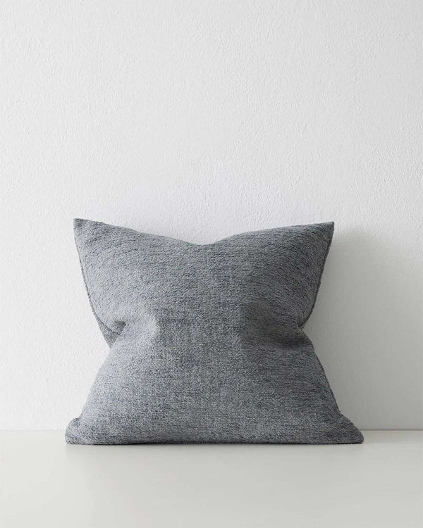 A softly textured blue grey cushion. 