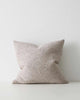 A textured taupe mushroom toned cushion. 