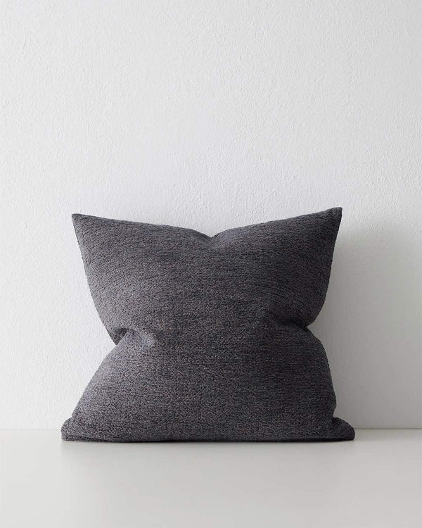 A soft textural cushion in muted midnight blue grey. 