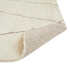 The Bower Linear rug with the corner folded to reveal underneath