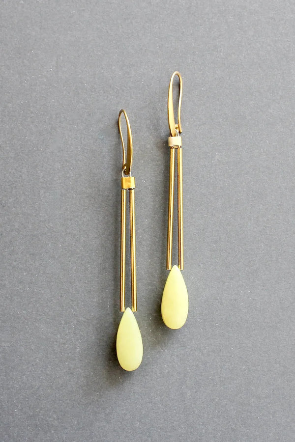 Elegant yellow jade dangle earrings with brass tubes and gold plated hooks, by David Aubrey