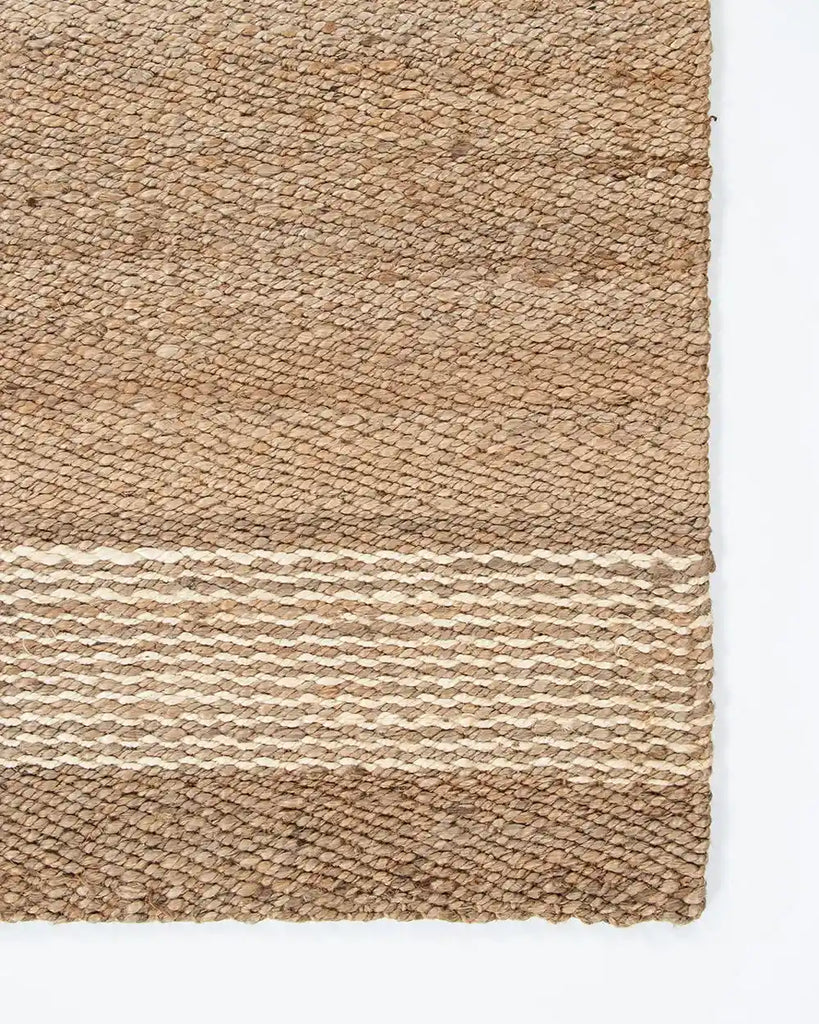 Close up view from above of the Baya Anglesea entrance door mat ,in 100% jute ,with contrast stripe