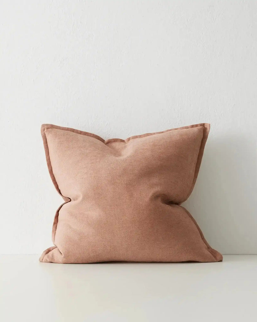 A square, soft clay pink cushion in a linen chenille blend by Weave Home nz