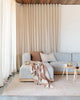 'Cyprian' cream and brown textural cushions by Baya decorating a couch in a stylish contemporary home 