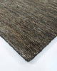 A corner image of the Fairbanks floor rug by Baya, handwoven and effortlessly chic. 