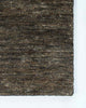 A corner image of the Fairbanks floor rug by Baya, handwoven and effortlessly chic. 