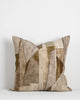 The Baya 'Grove Olive' cushion featuring an abstract print in brown and green tones