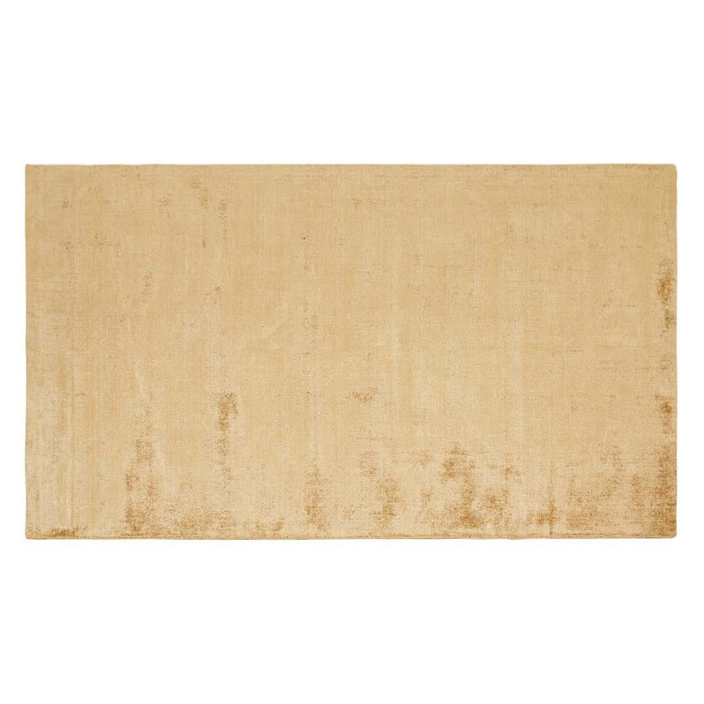 Full, top-down view of the weave of a warm, light honey mustard brown wool blend rug by Globe West and Soren Liv NZ