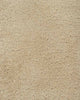A close up of the weave of the Norfolk floor rug in Sand. The luxurious depth of the pile and sumptuous warm beige colour make this rug a standout. 