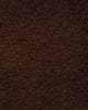 A close up of the weave of the Norfolk floor rug in Chocolate. The luxurious depth of the pile and sumptuous warm, deep brown colour make this rug a standout. 