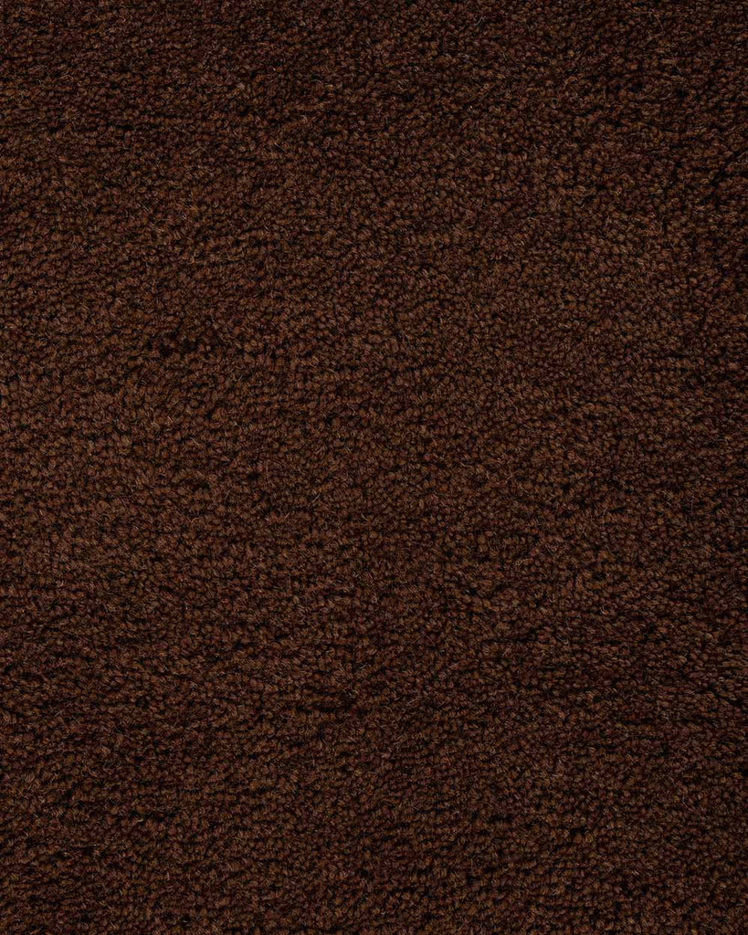 A close up of the weave of the Norfolk floor rug in Chocolate. The luxurious depth of the pile and sumptuous warm, deep brown colour make this rug a standout. 