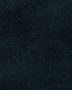 A close up of the weave, 100% wool, a deep navy blue luxuriously deep pile. 