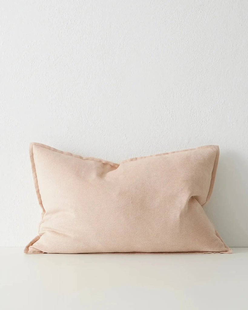 Pale pink lumbar cushion with flange detail, the Fiore Nectar by Weave Home nz