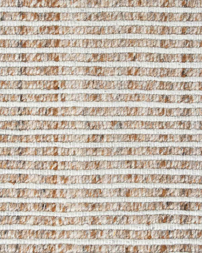 Close up view of the Rhodes Teak outdoor rug by Baya nz, showing the cream and brown striped weave
